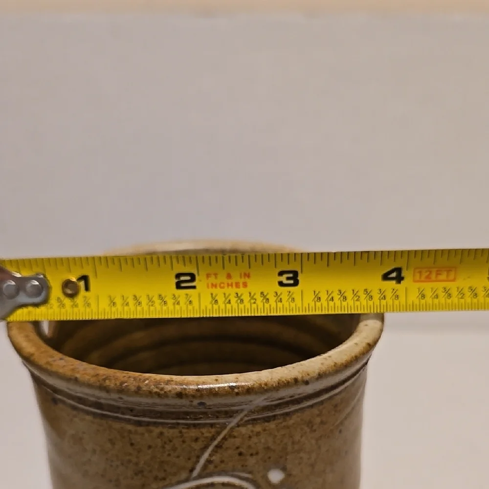 Brown Signed Pottery Vase with White Floral Design